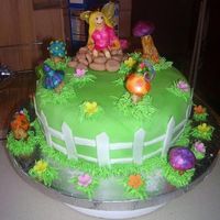 Fairy And 'shrooms This was my first attempt at a fondant figure. This was for my sister's bday who is really into fairies and Mushrooms