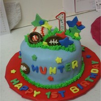 First Birthday Boy Covered and decorated with fondant.