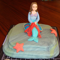Mermaid Topper for a little girl's 6th birthday party. She wore a mermaid costume that I tried to replicate.