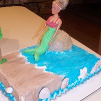 Mermaid Cake Mermaid birthday cake - buttercream with fondant accents. The seashells are made of fondant, as is the mermaid fin.