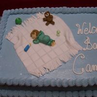Baby Camden's Cake This is a half sheet cake, half choc. and half white, with BC frosting and handmade fondant figures. It is for my daughter's best...