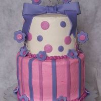 Girls' Birthday Cake This is a two-tiered French Vanilla cake made for a double birthday party for two girls. The lady said I could make whatever I wanted, just...