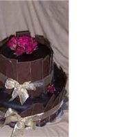 Chocolate Cake This is a Black Forest Cake with Raspberry Mousse filling & Chocolate Fudge Icing. Decorated with chocolate shards, ribbon & real...