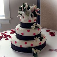 Black, White & Pink Polka Dots This is a cake I made for my sister's friend's wedding. It was supposed to be plain, but I since I am kinda out of practice...