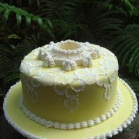 Birthday Cake For My Grandmother this is (although you cannot see it) a banana nut cake, covered in yellow vanilla flavored fondant, then brush embroidered with vanilla...