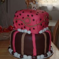 Pink & Brown Pony My daughter wanted a cake with horses on it and it had to be pink and brown her favorite colors. Chocolate fondant with cream cheese...