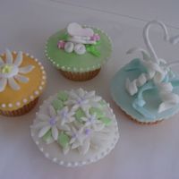 Cupcakes With Fondant Toppers a grouping we did for a bride to select from who wanted a spring effect