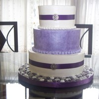 Purple Wedding Cake I made this as a gift for my father and step-mother's wedding. Had to first transport it to their house for the ceremony, then take it...