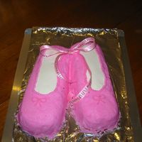 My Sister's B-Day My sister is a ballet dancer and she just turned 12 and i thought i should make a ballet shoe cake. .It is all buttercream and i got the...
