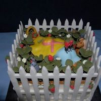 Strawberry Patch Cake Old lady crawling through her strawberry patch, strawberries, leaves, dog, bunny, ants, worm and fence made from gum paste. Hat made from...