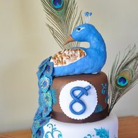 Peacock Cake Made for daughters b-day. Peacock is made out of rkt. LoVED the disco dust :o)