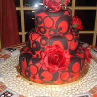 Red/black Circles All Fondant, Red Velvet Cake...I made this for my own Bday Party.