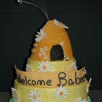 Babee Shower Gumpaste bee, Buttercream frosting Vanilla cake with Strawberry filling and chocolate cake hive. This cake was alot of fun to make.