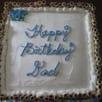 Another Cake For Tisha this one was for her husband. Chocolate fudge cake with rich vanilla bc icing. covered the sides with chocolate pirouette cookies tied with...