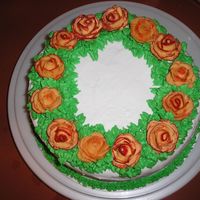 Roses this is one of the first cakes i made. it was for a birthday. now i cant remember wha tkind of roses i was trying to imitate... but i...