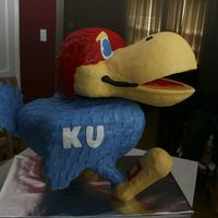 3D Jayhawk Being a K- state fan, this was a challenge... He has a wood frame, covered with rice krispies on the bottom half and cake, obviously, on...