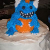 Little Monster this was for my youngest son's first brithday. it is a small bear cake mold that i starred to to make into the shape it is in now.