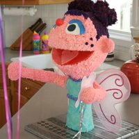 Abby Cadabby She was for a 2 year olds birthday. i had trouble with the rice krispies sticking to the frame, but she turned out all right in the end......