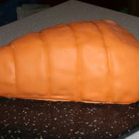 Carrot Cake A cake for a garden party. i sued mmf and gumpaste for the stalk... and yes it is carrot cake. ha ha