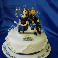 Silver Anniversary Fondant covered cake (cushion is RKT) and modellingpaste models.