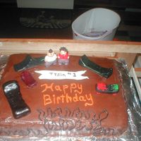 Skateboard Cake Different View Birthday cake I did for a family....figures are made from mmf and some with wiltons fondant.