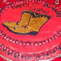 Colbe's First Cake This was made for a family member. His parents are ranchers, and wanted something "westerny". I also made a cookie bouquet...