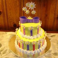 Daisy Bridal Shower Cake Made this for a couples shower cookout, so I wanted something bright and informal. Buttercream with fondant accents.