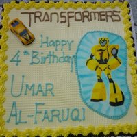 Transformers Chocolate cake and butter cream .Unable to get the edible print of the robot and had to draw it on a piece of fondant myself.