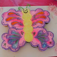 Butterfly Cupcake Cake I made this cake for my daughter's first birthday. It was outside so having cupcakes was much easier to do, but I still wanted it to...