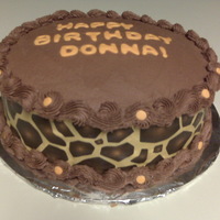 Giraffe Print Chocolate Buttercream with fondant and giraffe edible icing image.