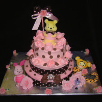 Winnie The Pooh This was for a baby shower. Buttercream icing with fondant figures. The heads were purchased and than the bodies were hand molded out of...