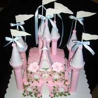 Jasmine's Castle Strawberry and White castle cake. This was for a 3 year old's Princess party.Decorated with fondant and buttercream.