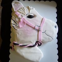 Horse Cake Carved cake iced in buttercream with satin ice fondant and painted details