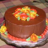 Fall Flowers Cake This is a chocolate cake with chocolate buttercream frosting. The roses and decorations are vanilla buttercream. In real life the flowers...