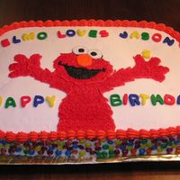 Jason's 2Nd Birthday Cake This was my son's 2nd birthday cake. The letters are fondant, the rest is BC. Those are M&M Minis on the sides.