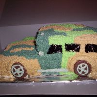 Hummer - Side View Double choc cake, triple fudge filling, BC frosting in camouflage colors. The colors did not come out quite right... I couldn't get...
