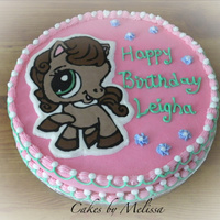 Littlest Pet Shop yellow cake, buttercream frosting and FCMTcupcakes adorned the cake