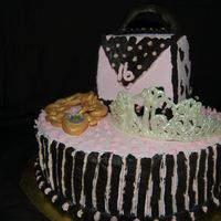 Sweet 16 This was made for my niece turning 16! The cake is strawberry with fresh strawberries. I used fondant for the bracelet and chocolate for...