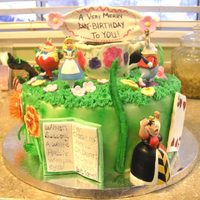 Disney Classic Alice In Wonderland Cake The customer bought the figurines and asked that I incorporate them into the cake. Vanilla butter cake with vanilla buttercream. All other...
