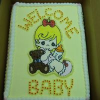 Precious Moments Baby Shower This is my first paying baby shower cake after only three classes. I think I am getting better at this..:-) The picture is a buttercream...