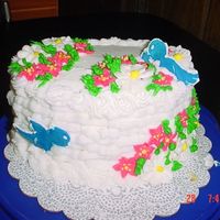 My Finial Cake Course 2 I decided to do daisies and apple blossoms....Flowers just don't like me for some reason...allthough I can do the leaves, boarders and...