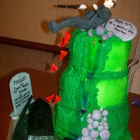 "over The Hill" Mock 40Th Birthday Cake Totally Gluten Free cake. Fumpaste/fondant Rocks. Pipping Gel waterfall. Gumpaste Tumbstone, and black coffin. Golf flags gumpaste as well...