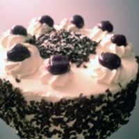 Black Forest Cake Your typical black forest cake. Chocolate cake layers with chocolate whipped cream filling and kirsch-soaked cherries. Frosted in regular...