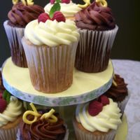 Lemon Fruit And Death By Chocolate White cakes with a lemon filling and a buried raspberry.Chocolate cakes with a white chocolate mousee filling and chocolate frosting.Nummy...