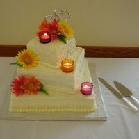 Daisies This was my first wedding cake. Thank goodness for flowers!