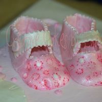 Close Up Of Baby Shoes Close up of mary jane style gumpaste baby shoes with pearl dust
