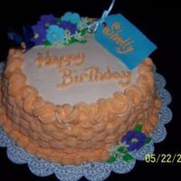 Phpcindqmpm.jpg BC basket weave in peach with lavender flowers, fondant/gumpaste name tag