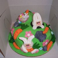 Bunny's On Hill White cake with chocolate filling carved out with fondant on top everything in fondant.