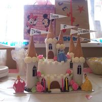 Castle Cake I made this for my daughter it's a strawberry shortcake with strawberry flavor fondant. The towers are paper towel rolls wrap with...