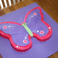 Butterfly Cake This a a butterfly birthday cake for my 5-year-old daughter. The purple part of the wings and the body are MMF the rest is buttercream.